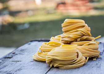 Fresh Homemade Pasta on the wooden table.