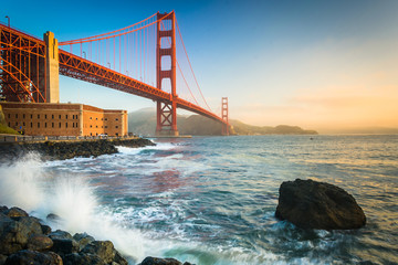 The Golden Gate Bridge, seen at sunrise from Fort Point, San Fra