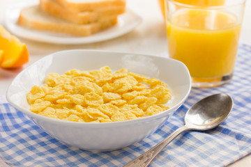 Healthy breakfast. Corn flakes and milk.