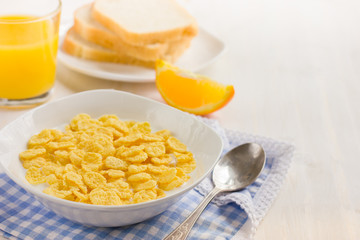 Healthy breakfast. Corn flakes and milk.