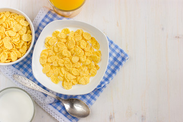 Healthy breakfast. Corn flakes and milk.