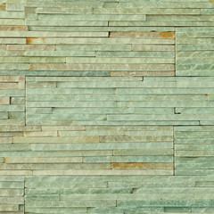 Green background of brick stone wall texture pattern