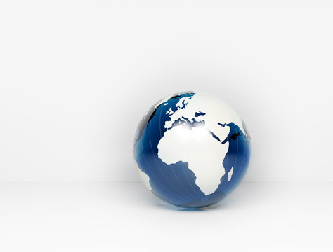 Blue glass world globe with copy space background wall