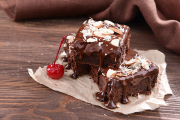 Delicious chocolate cakes on table close-up