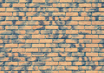Red brick stone wall seamless background and texture