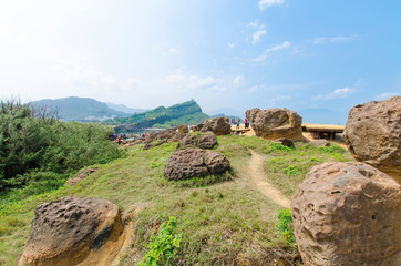 Gorilla rock and arch rock in Yehliu Geopark, Taiwan.