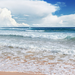 waves sea and yellow sand