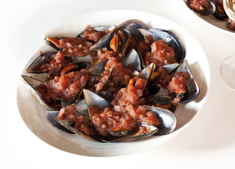 Mussels cooked with tomato sauce