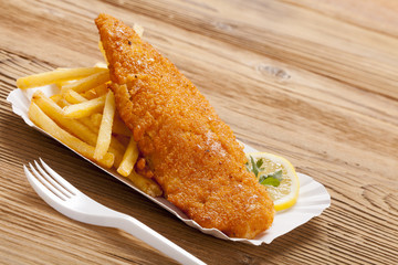 Fried fish and chips on a paper tray