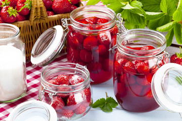 Fototapeta na wymiar Homemade preserves, prepare compote of strawberries.