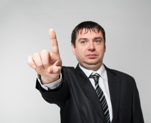 businessman pointing her finger