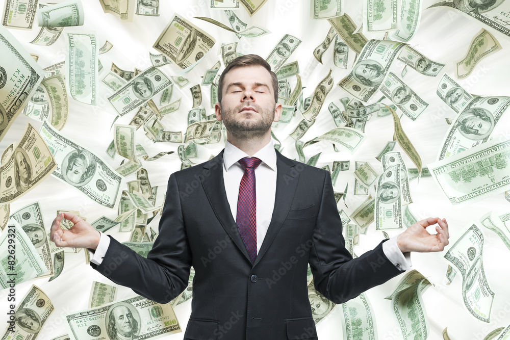 Wall mural meditative young businessman.