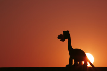 Dinosaur waiting for sunrise.