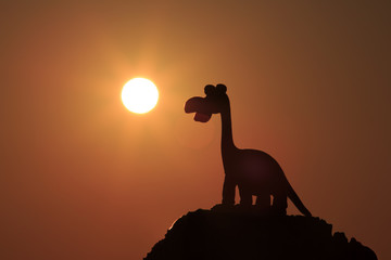 Dinosaur waiting for sunrise.