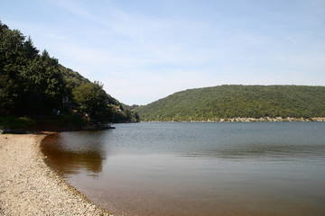 View of the mountain lake in the sunny day