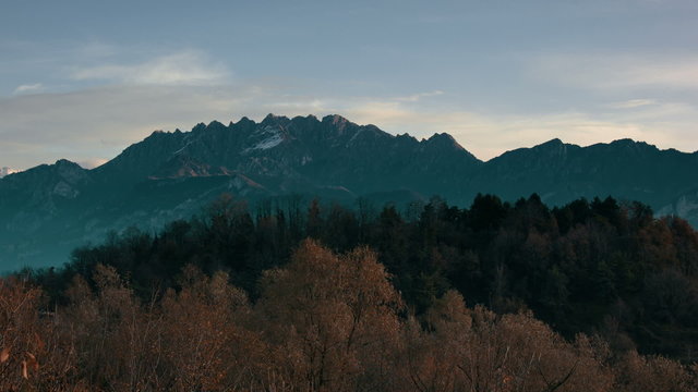 Morning time-lapse of alpine mountain