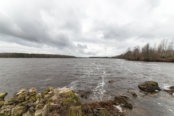 dramatic clouds over the river