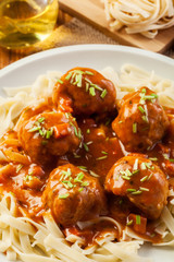 Pasta fettuccine and meatballs with tomato sauce