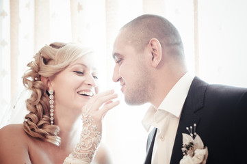 Happy young bride and groom on their wedding day. Wedding couple