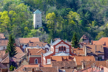 Fototapeta na wymiar The black tower(Turnul negru) over the rooftops