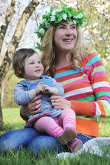 Mother and baby girl laughing