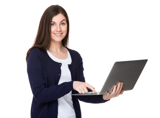 Brunette woman use of laptop