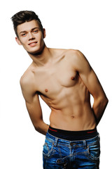 Fototapeta premium A young man with a beautiful physique.