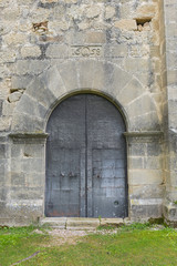 Fototapeta na wymiar Puerta de iglesia del siglo XVII.