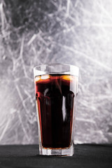 soft drink being poured into glass