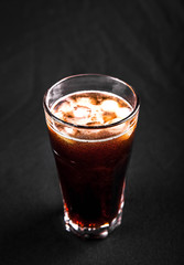 soft drink being poured into glass