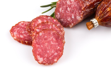 Sliced salami on white