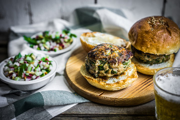 Healthy homemade burger on wooden background