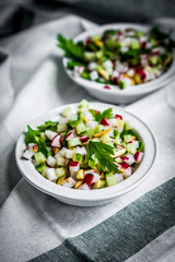 Vegetable salad on wooden background