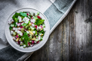 Vegetable salad on wooden background