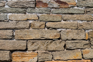 Abstract weathered stone brick wall background