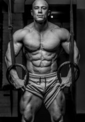 Fototapeta na wymiar Black and white photo of awesome bodybuilder