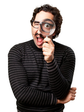pedantic man with a magnifier surprised