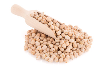 Uncooked chickpeas and wooden scoop