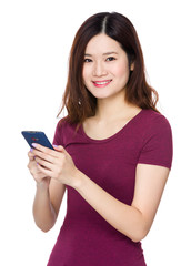 Naklejka premium Young woman use of mobile phone