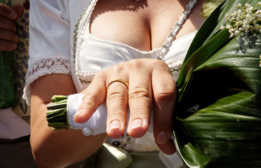 Bride showing off her wedding ring