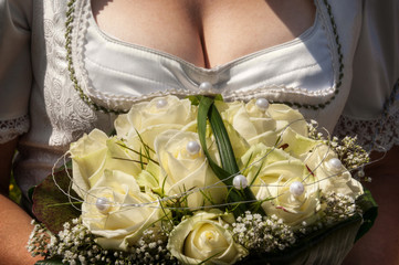 bride showing off her bouquet