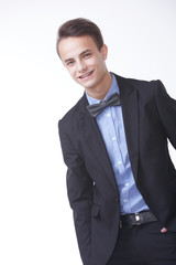 young handsome man in elegant suit with butterfly