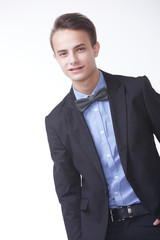 young handsome man in elegant suit with butterfly