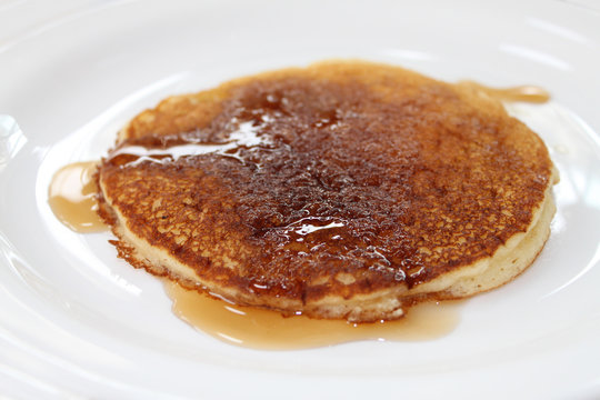 Pancake Drizzled with Maple Syrup