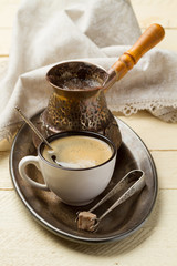 Metal tray with fresh coffee for breakfast