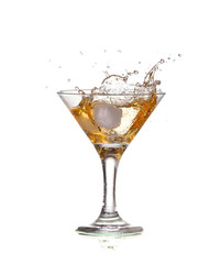 alcohol cocktail with splash of ice isolated on white