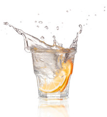 cocktail in a martini glass on a white background with fruit