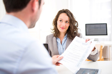 Young attractive woman during job interview