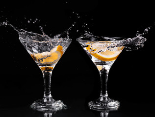 Vermouth cocktail inside martini glass over dark background