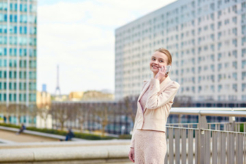 Fototapeta premium Young confident business woman in Paris